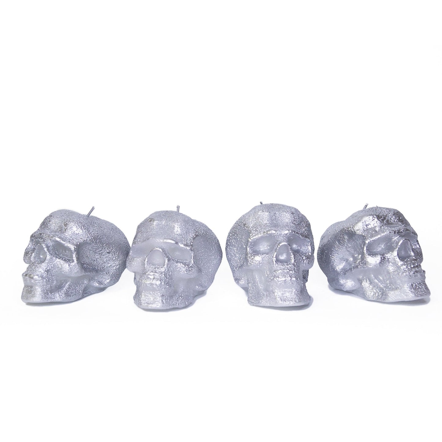 Swiece CANDWAX Srebrne Male Czaszki - 4 SZT.